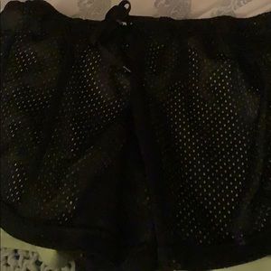 Bright green and black shorts